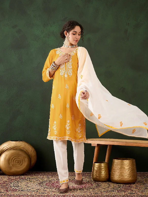 Yellow Attractive Looking Pant Suit With Designer Chikankari Embroidery Work Comfortable Pleated Pants Yellow Attractive Looking Pant Suit With Designer Chikankari Embroidery Work Comfortable Pleated Pants